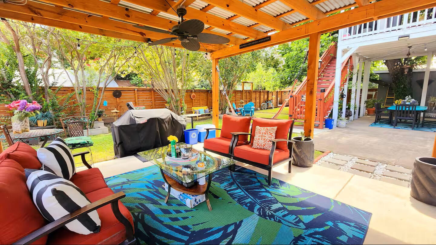 Covered Patio Lounge • Outdoor Seating & Grill Area